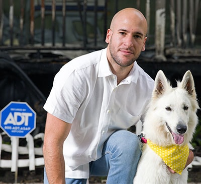 McKenzie Hartman and his dog Daisy.