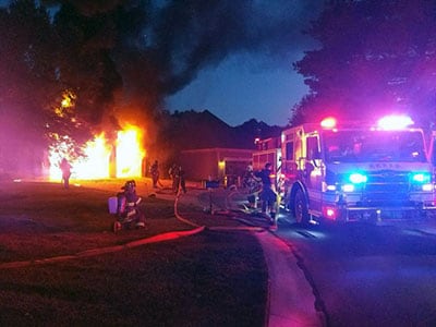 Kansas City, MO Fire Department putting out the fire at the Hoffman's home.