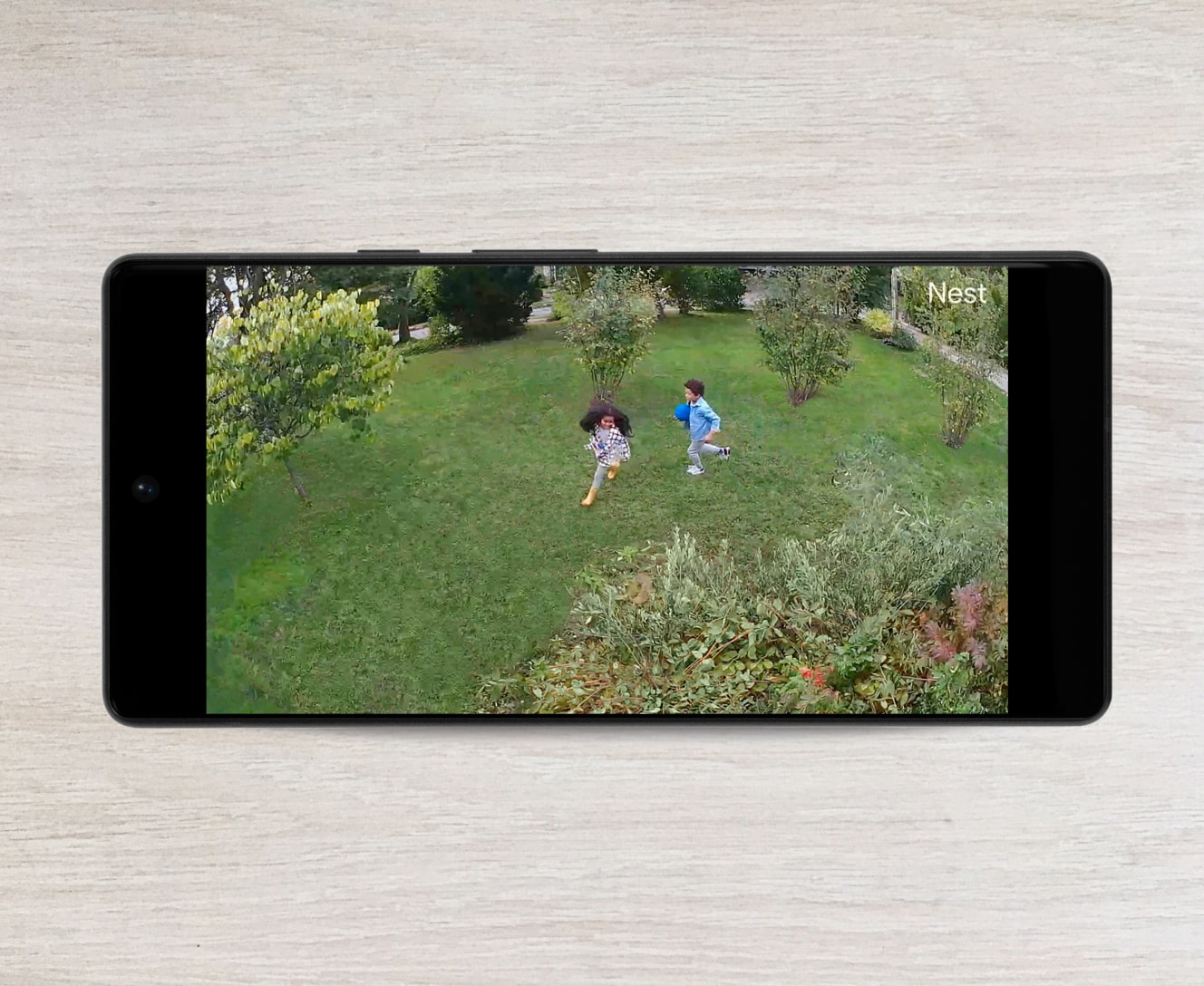 Video surveillance on a cellphone from the Google Nest Cam with floodlight