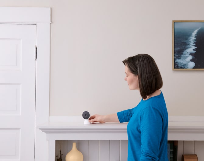 ADT call center employee working and talking into a headset 